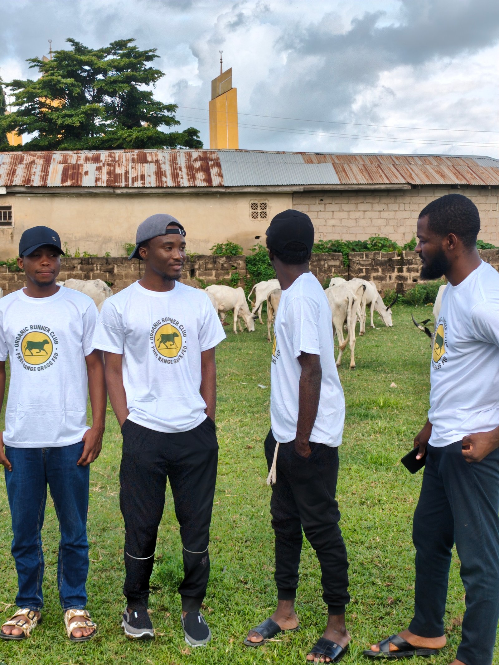 People wearing Nova Prime shirts during a livestock visit